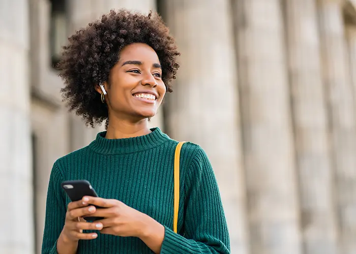 smiling woman on phone
