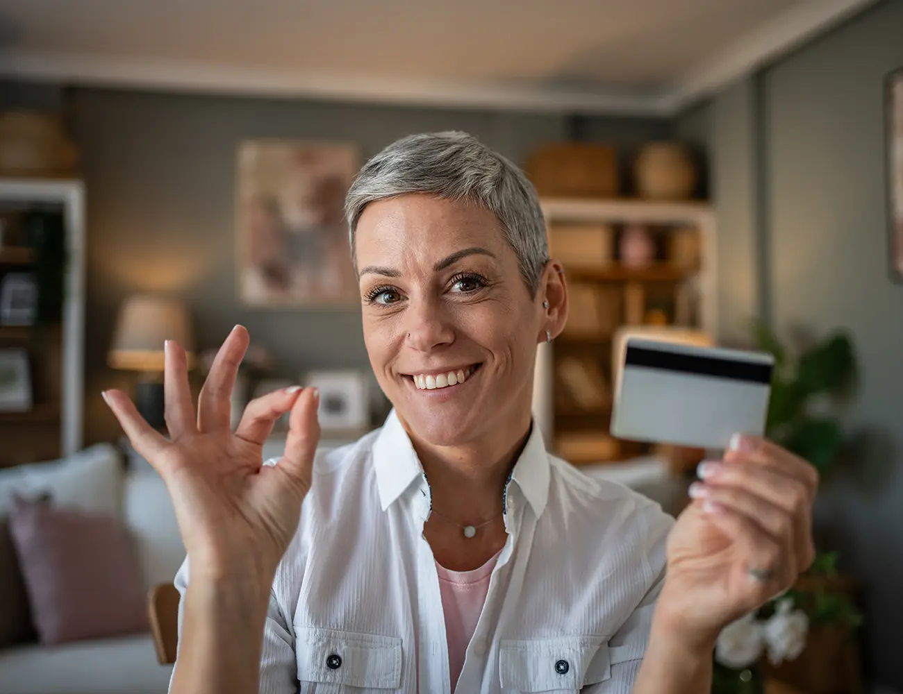 woman holding credit card