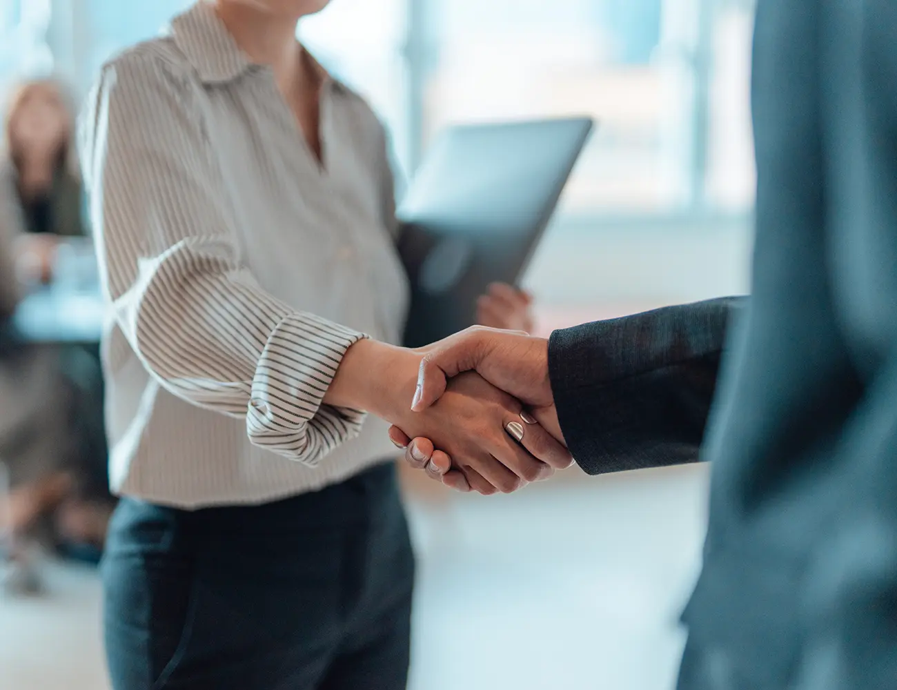 man and woman shaking hands